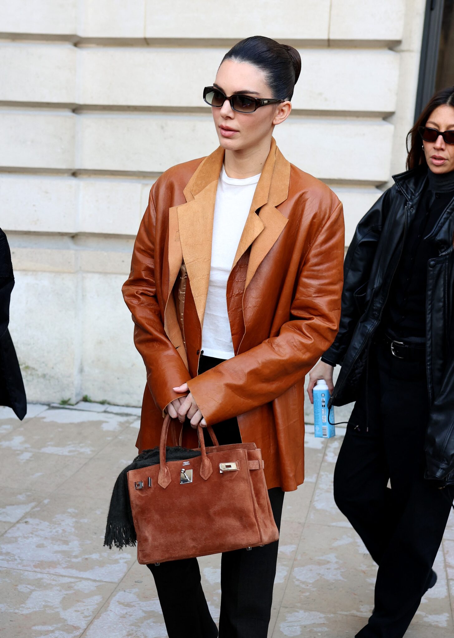 Kendall Jenner outside Schiaparelli during Haute Couture SpringSummer 2025 as part of Paris Fashion Week George V Magazine